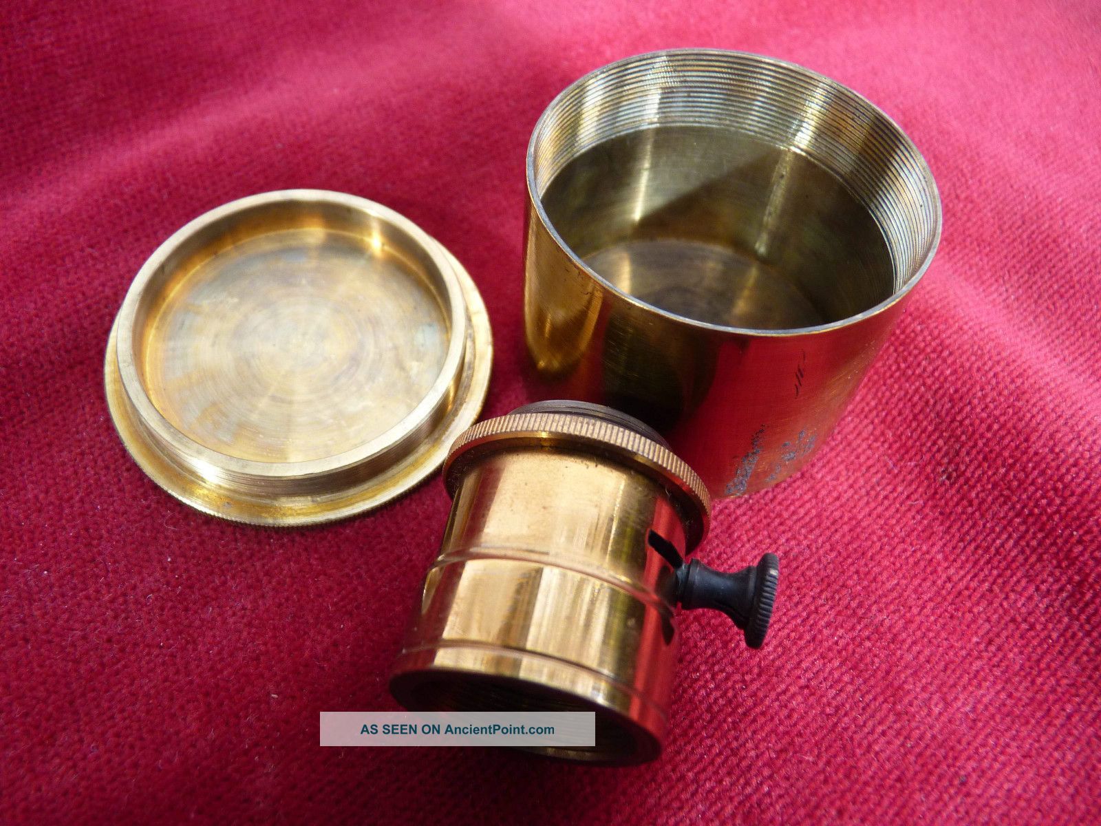 A Gilded Vertical Illuminator In Case By W.  Watson & Sons Other photo