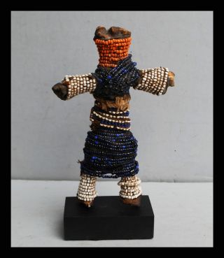 A Fali Bone Doll With Glass Bead Decoration,  From Cameroon photo