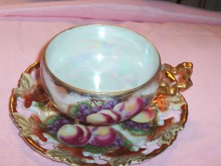 Set of two Royal Sealy China tea saucers or small plates. Both saucers have the  same pattern with gold trim. They both have an iridescent.. ROYAL SEALY  CHINA Lusterware tea saucers made in Japan. Dimensions: 6 inches. Back to my.