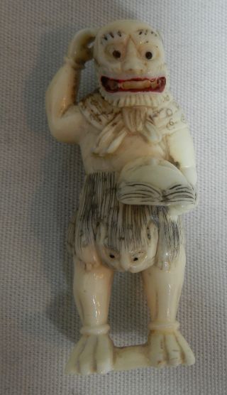 Japanese Antique Faux Ivory Netsuke Okimono Scary Buddhist God Holding Mask photo