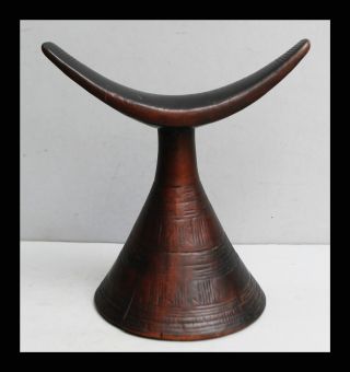 A Statuesque Ethiopian Headrest With Immaculate Form photo