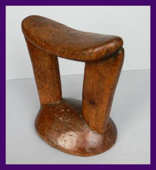Unusual Shaped Headrest From Ethiopia With Golden Hue photo