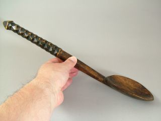 A Fine Hand Carved Zulu Spoon. photo