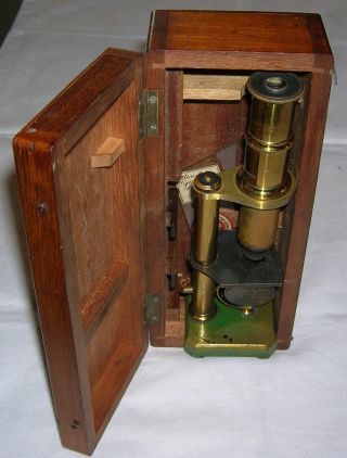 A Fine Antique Field Student Microscope Complete With Its Box photo