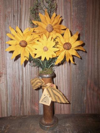 Gathering Of Primitive Handmade Sunflowers In Old Vintage Wood Spool photo
