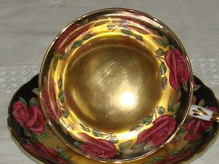 Exquisite Paragon England Fine Bone China Cup And Saucer.  Gold And Roses. photo