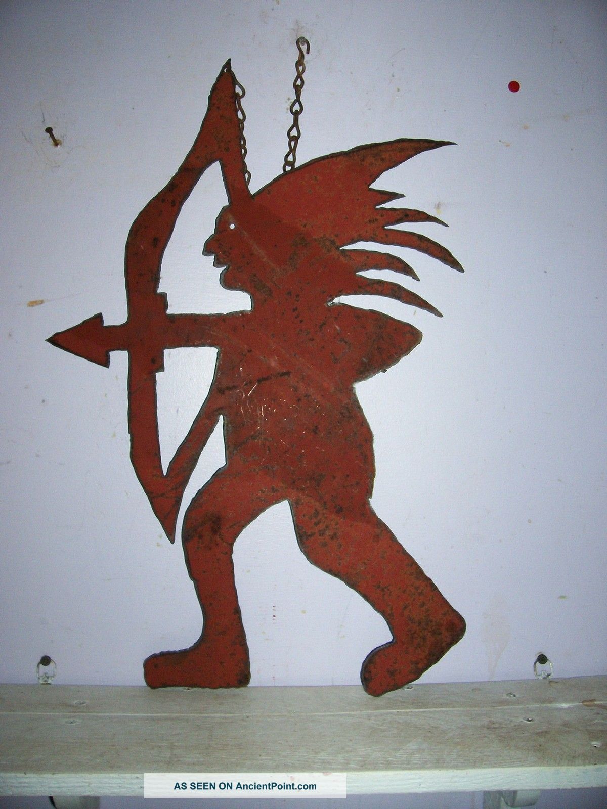 Great Red Rusted Indian Whirligig ? Weathervane ? Sign Hanging From Old Rusted Primitives photo