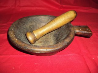 Antique Wooden Mortar And Pestle photo