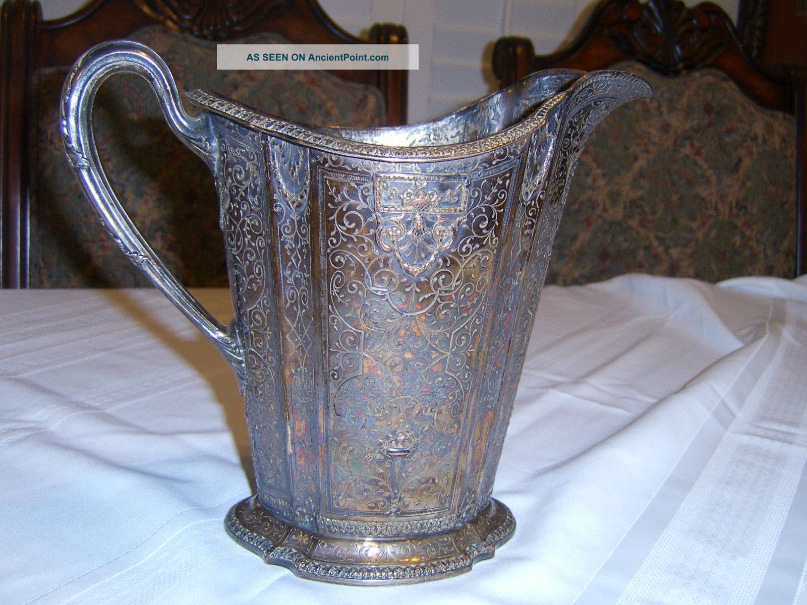 Antique Silver Water Pitcher : Repousse Coin Silver (.900) photo