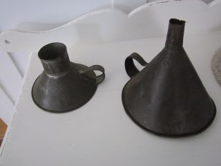 Two Tin Funnels,  Different Sizes.  Ones. photo