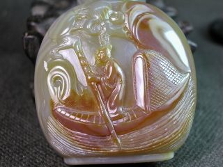 Chinese Elder Rowing Carved Agate Snuff Bottle photo