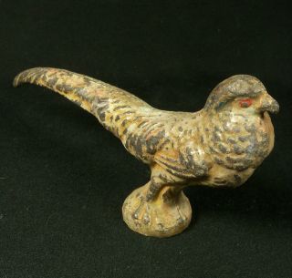 Antique Colored Pewter Figurine Representing A Pheasant Found In An Old Well photo