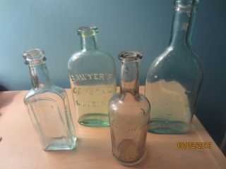 Antique Mold Blown1800s Bottle Of 3 Medicine Bottles And 1 Soap Bottle photo