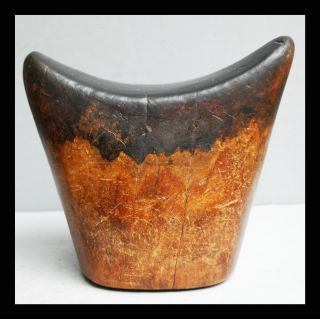 An Exceptionally Heavy + Well Patinated Headrest From Ethiopia photo