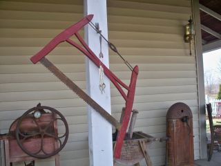 Antique Buck Saw Primitive Barn Tool Vintage Farm Rustic Decor Chippy Red Paint photo