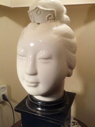 A Stunning White Porcelain Big Head Of A Woman photo