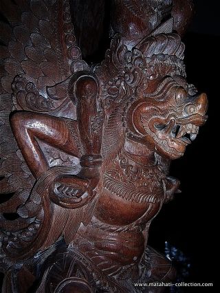 An Old,  Tall And Heavy Wooden Balinese Statue,  Ramayana,  Hindu,  Bali,  Indonesia photo