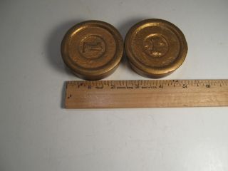 2 Antique Cast Iron One Pound Scale Weights Painted Gold photo