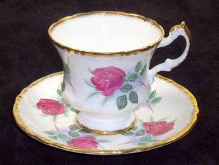 Excellent Paragon Bone China Raised Embossed Design Cup And Saucer Set photo