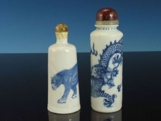 Two 19th C.  Chinese Blue And White Snuff Bottles,  Dragon And Lion Decoration photo