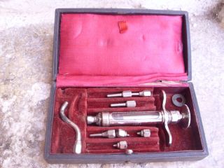 An Antique French Boxed Glass Syringe With 8 Syringe Attachments No285714 photo