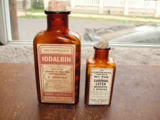 Amber Early 1900s Labeled Medicine Bottle Of Two Parke Davis Detroit Bottles photo