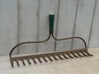 Old Rusty Green Iron Rake Heads Garden Tool Decor photo