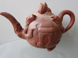 Chinese Pottery Yixing Zisha Teapot Purplish Red Carving Dragon Three Feet photo