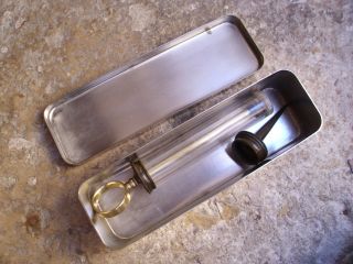 A Vintage French Boxed Glass & Bakelite Syringe In A Stainless Steel Box photo