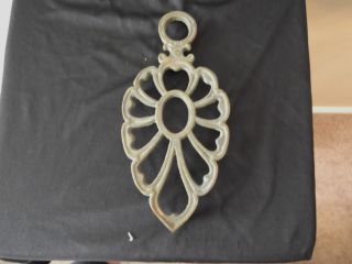 This Is A Antique Brass Trivet. photo