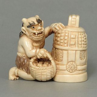 Antique Japanese Netsuke Demon Playing Dell Carving H1976 photo