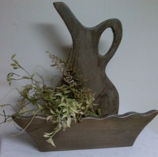 Primitive Antiqued Milk Jug With Greenery photo