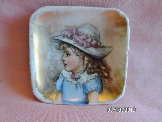Antique Vintage Miniature Porcelain Plate With A Hand Painted Portrait Of A Girl photo