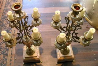 A Antique Marble And Brass Candlesticks photo