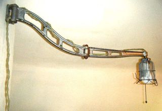 Cast Iron Swing Arm Articulated Wall Light photo