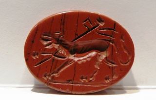 Authentic Etruscan Red Jasper Intaglio Depicting A Wounded Lion With A Spear photo