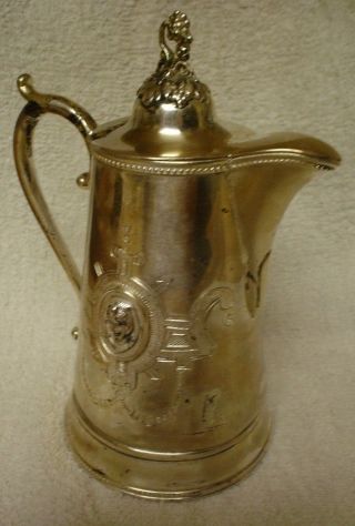 Victorian S.  P.  Syrup Pitcher W/ Figural Medallions photo