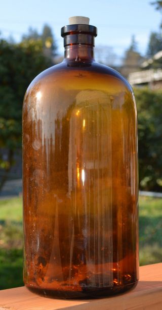 Large Antique Brown Glass Bottle W Cork Stopper photo