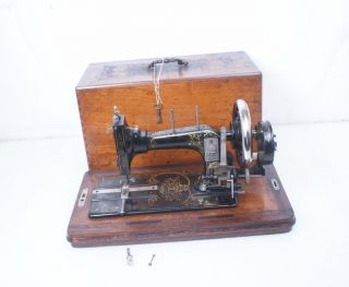 Antique German Frister & Rossmann Hand Crank Sewing Machine photo