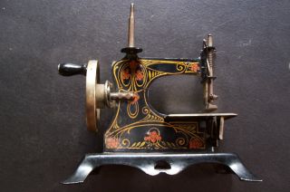 Antique Tin & Cast Iron Decorated Toy Sewing Machine - Germany photo