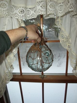 Antique Clear Glass Japanese Glass Blown Fishing Float Ball With Net photo