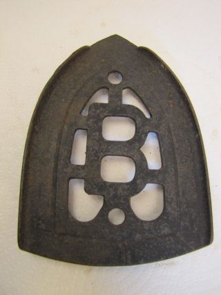 Antique Cast Iron Trivet - B photo