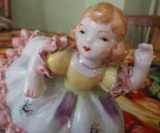 Vintage Porcelain Figurine Of Little Girl Dancing,  Lace Trim,  Flowered Dress photo
