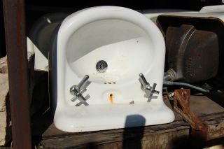 Antique Oval Sink With Hardware photo