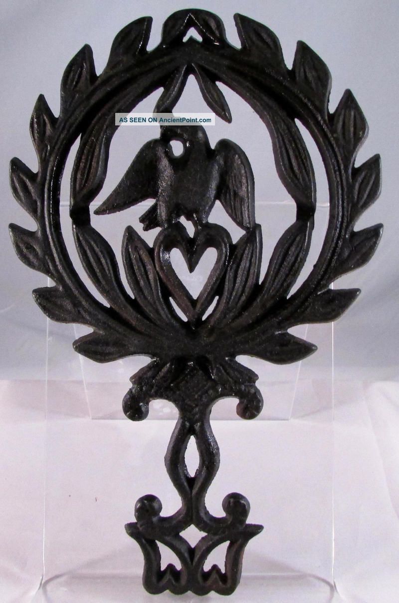 Vintage Griswold Cast Iron Eagle & Heart Footed Trivet - No.  1730 Trivets photo