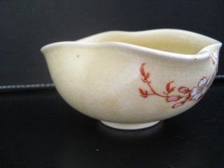 Chinese Yellow Celadon Small Bowl With Floral Motif photo