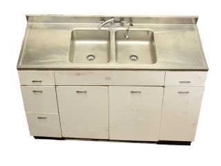 Salvaged Metal Sink And Cabinet Base photo