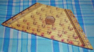 Musical Instrument 15 Stringed Brazilian Zither Or Banjo Played On The Lap photo