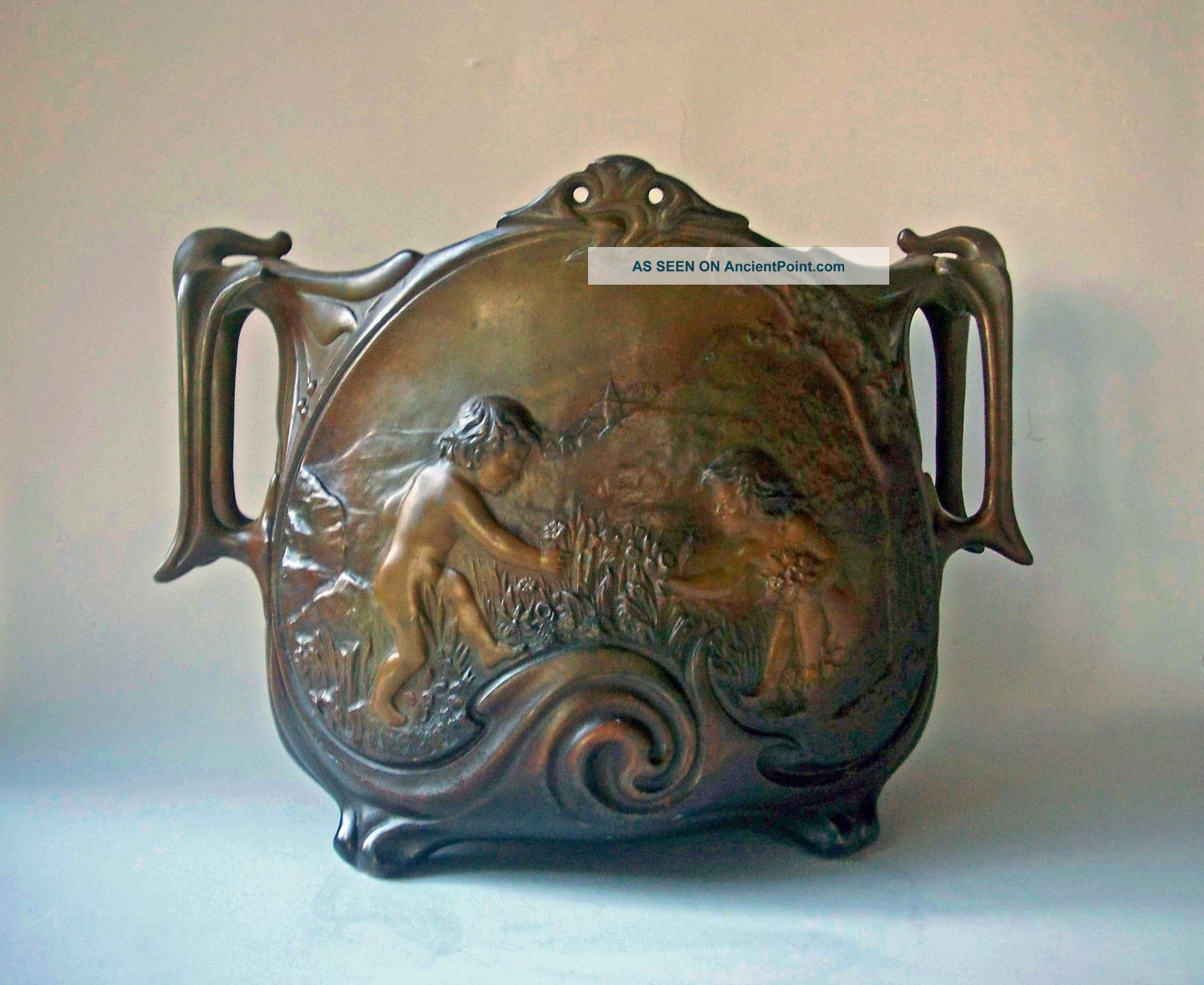 1900 French Art Nouveau Jugenstyle Cast Cupid Flower Relief Sign J.  Garnier Pot Art Nouveau photo