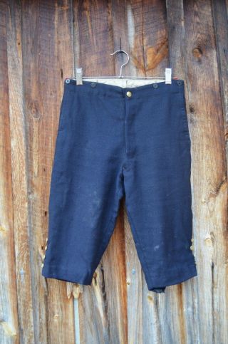 Antique Metal Anchor Buttons On Navy Womens Or Kids Shorts photo